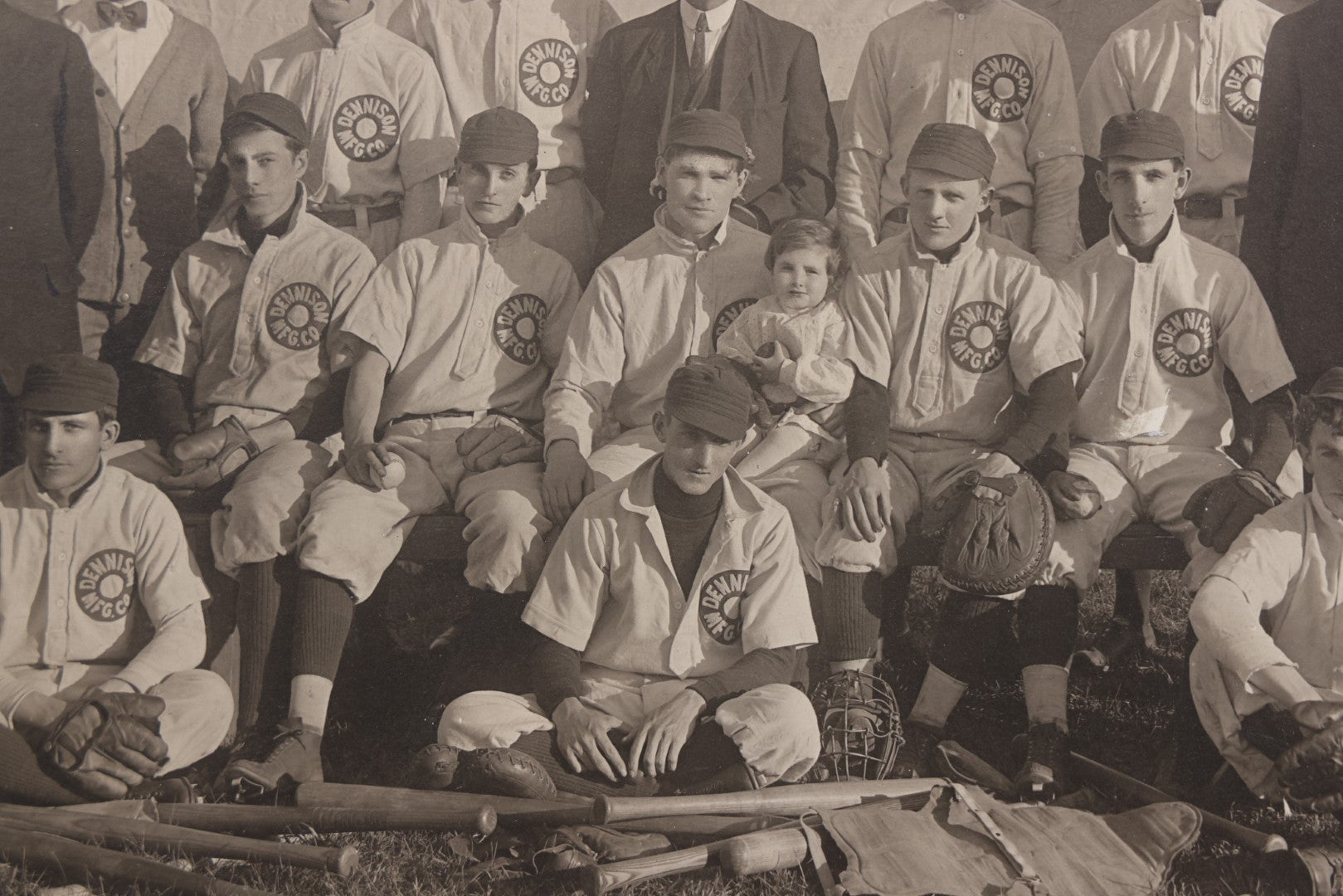 Lot 068 - Antique Boarded Photograph Of The Dennison Manufacturing Co. Baseball Team, Posing With Dennison Banner, Equipment, Circa 1915, Framingham, Massachusetts