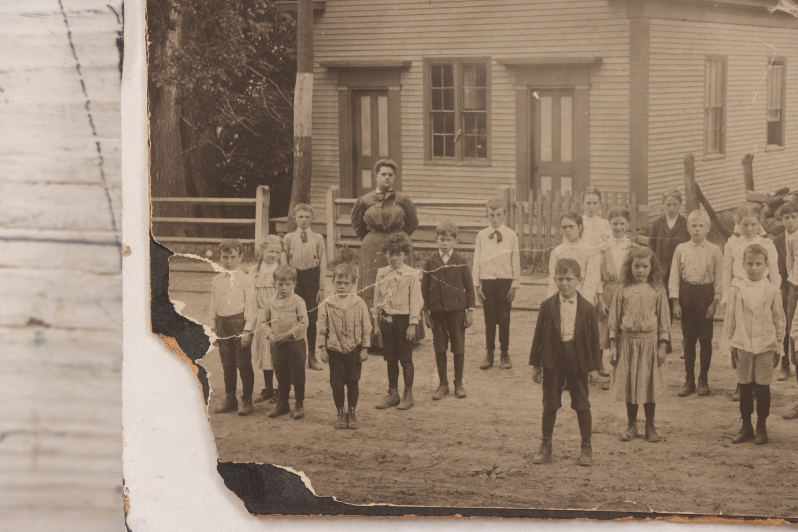 Lot 073 - Antique Boarded Photograph Of School Class Standing Apart And In Unnatural Pose, With Teacher In Front Of "Maple School," One Child Identified As "Ernie" 