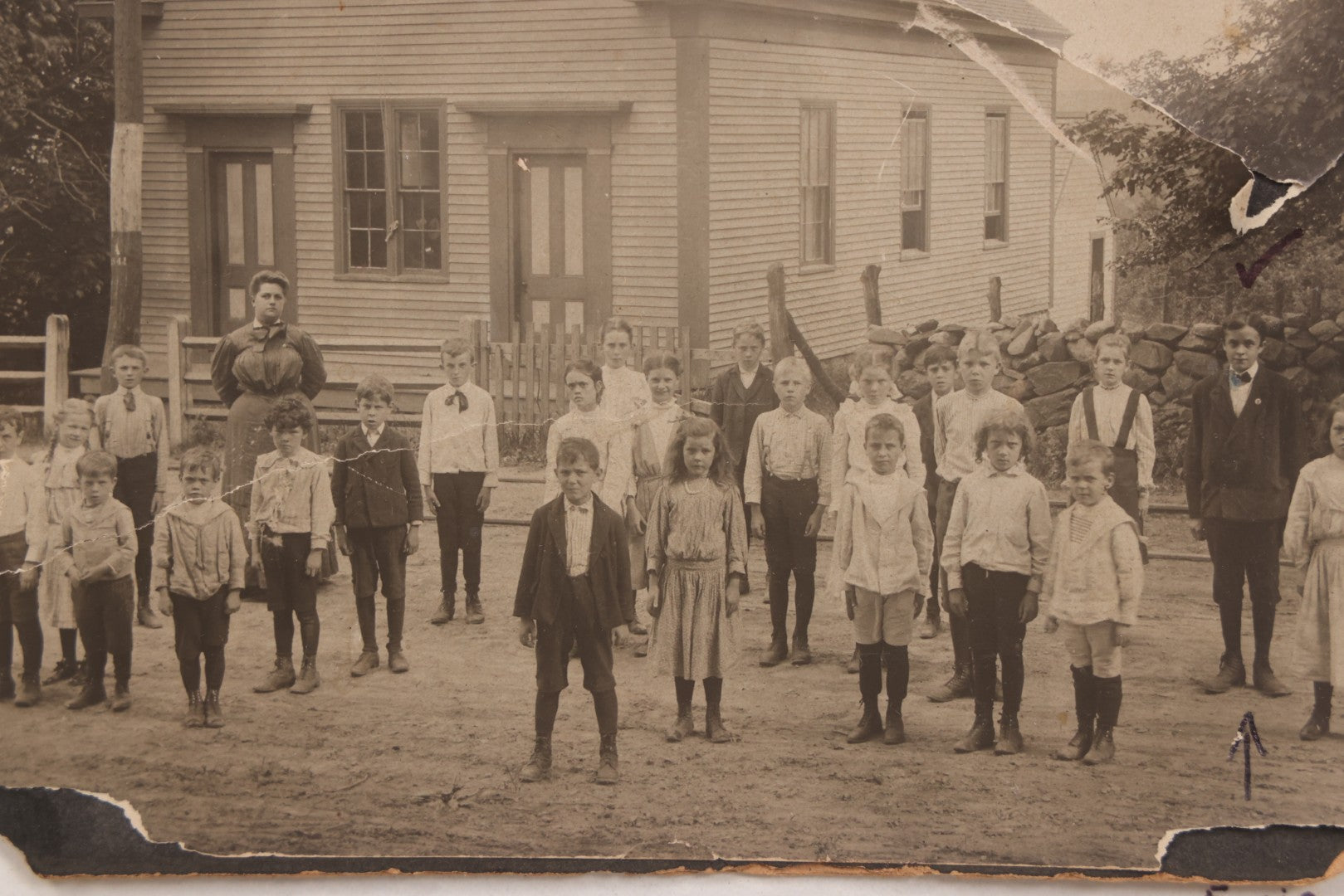 Lot 073 - Antique Boarded Photograph Of School Class Standing Apart And In Unnatural Pose, With Teacher In Front Of "Maple School," One Child Identified As "Ernie" 