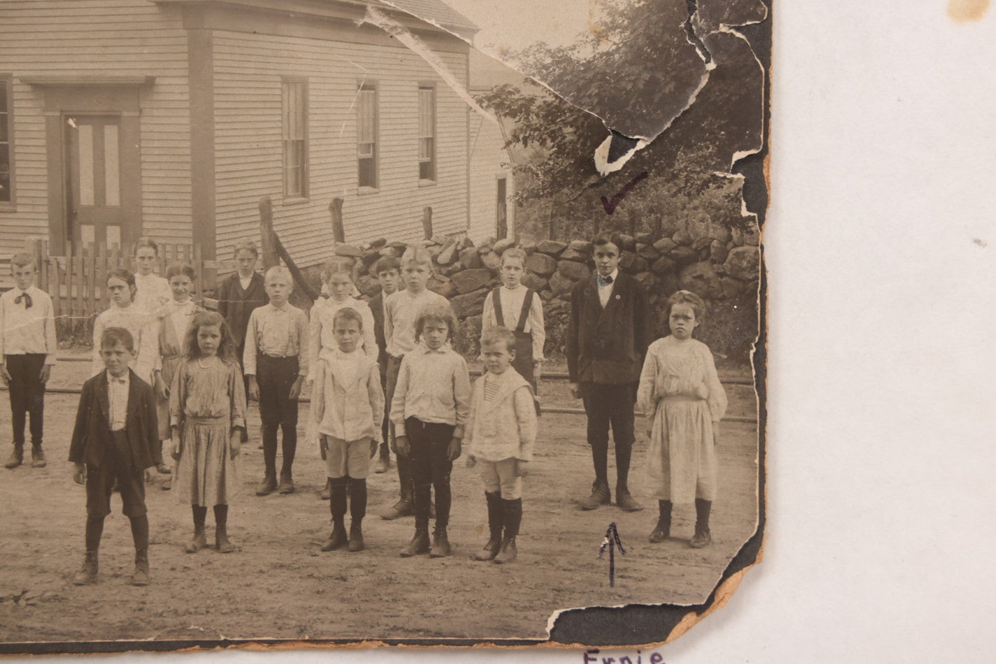 Lot 073 - Antique Boarded Photograph Of School Class Standing Apart And In Unnatural Pose, With Teacher In Front Of "Maple School," One Child Identified As "Ernie" 