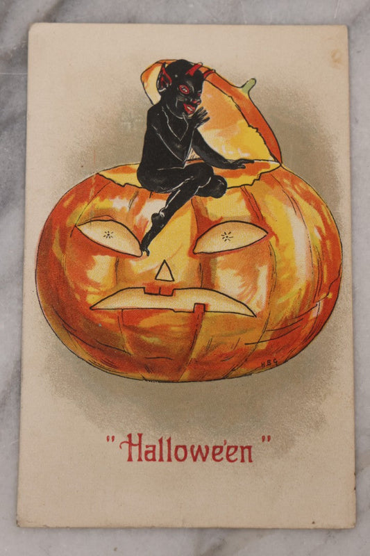 Lot 093 - Antique Embossed Halloween Postcard With Mischievous Childlike Black Demon Elf Figure And Terrified Pumpkin, Printed In Germany, Postmarked 1911