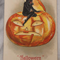 Lot 093 - Antique Embossed Halloween Postcard With Mischievous Childlike Black Demon Elf Figure And Terrified Pumpkin, Printed In Germany, Postmarked 1911
