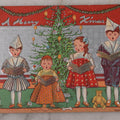 Lot 096 - Antique Embossed Christmas Postcard, "A Merry X'Mas" With Silver Coloring, Featuring Caroling Children, Toys, And Christmas Tree, With Embossed Christmas Seal Sticker On Verso, Postmarked 1909