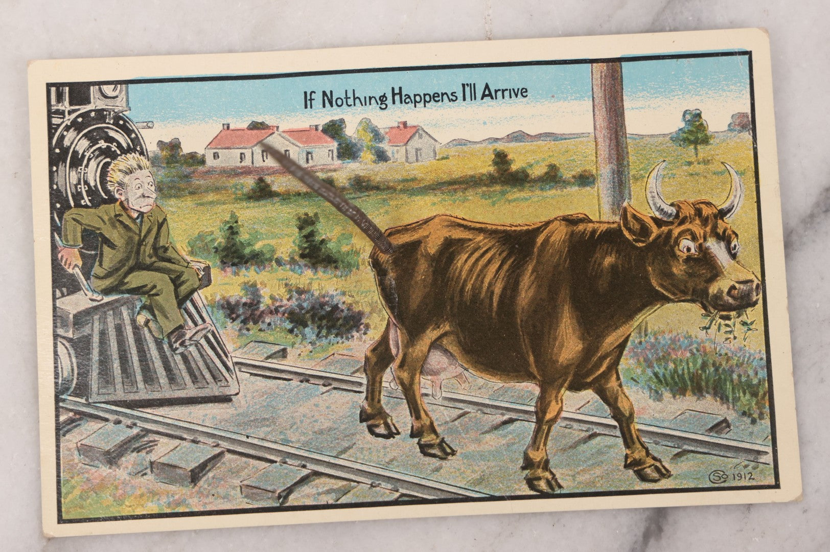 Lot 100 - Antique Comic Novelty Mechanical Postcard , "If Nothing Happens I'll Arrive," With Cow And Real Spring Tail, Speeding Train, Published By Schmidt Bros. & Co., Chicago, Circa 1912