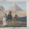 Lot 103 - Antique Photo Postcard Of Egypt Tourism With Added Color, Man On Camel With Guides In Front Of Pyramid Of Giza And Sphinx, Undivided Back, Circa 1907