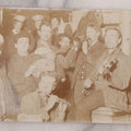 Lot 105 - Antique Real Photo Postcard R.P.P.C. Of Band Including Flute, Fiddle And Banjo, Playing While Crowded Into A Corner Of Storage Room, With Other Men And Women In Background, Circa 1910