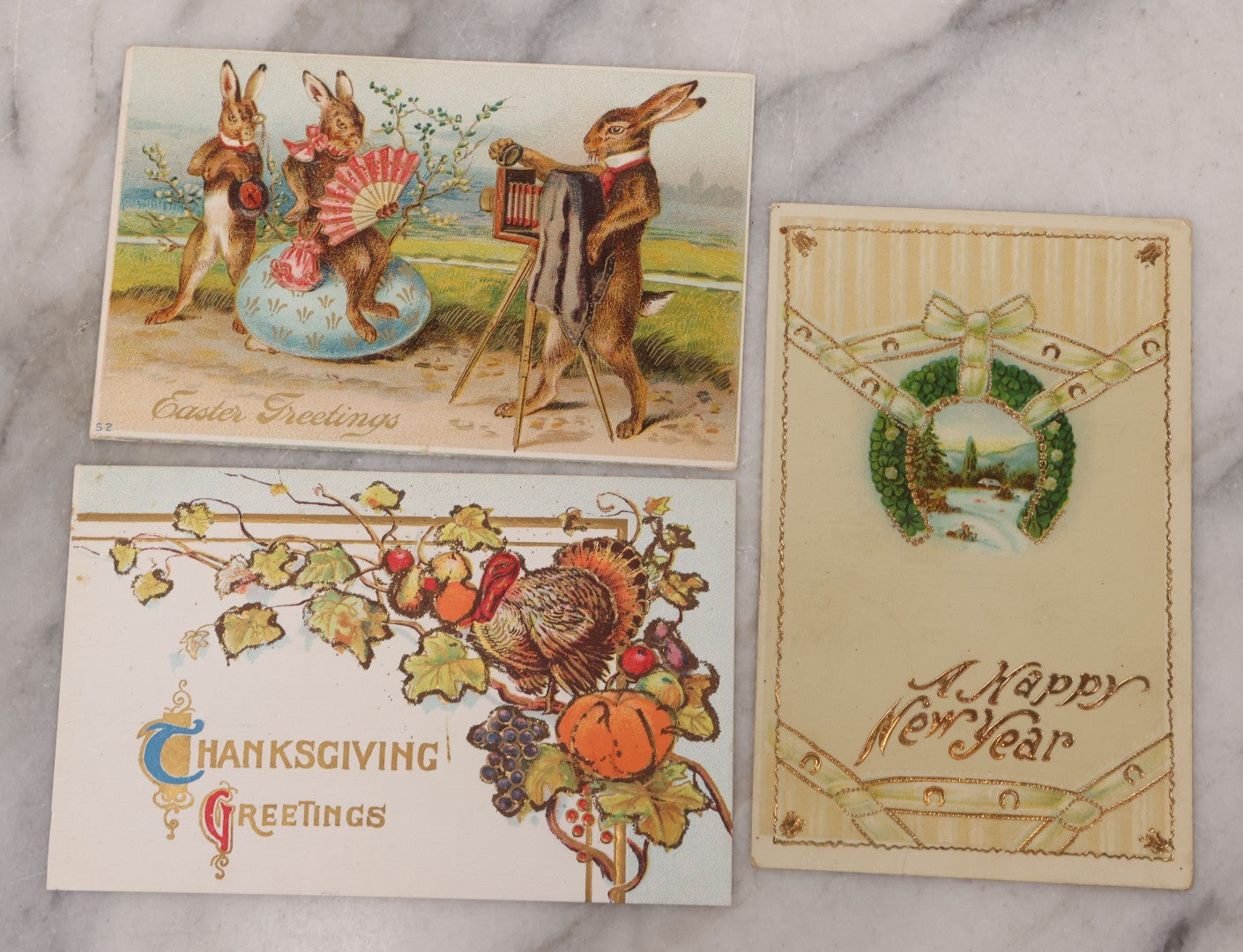 Lot 111 - Grouping Of 25 Antique Holiday Postcards, Most Embossed, Some With Glitter, Including New Years, Easter, Thanksgiving And More