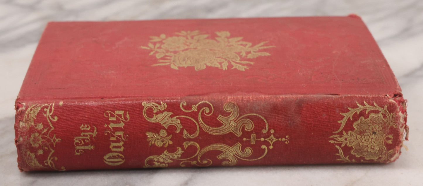 Lot 118 - "The Oasis" Antique Collected Poetry And Prose Book Edited By N.L. Ferguson With Illustrated Cover Page, Embossed Gold Lettering And Designs On Spine And Cover, Published By Dayton And Wentworth, Boston, 1855
