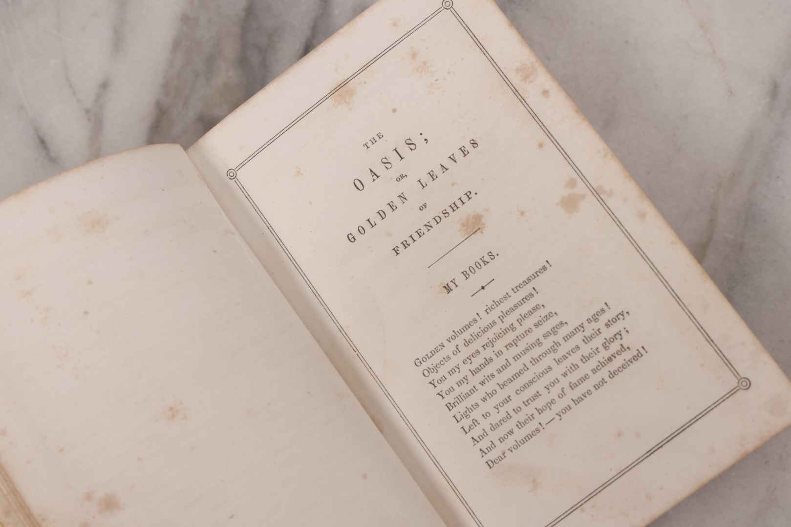 Lot 118 - "The Oasis" Antique Collected Poetry And Prose Book Edited By N.L. Ferguson With Illustrated Cover Page, Embossed Gold Lettering And Designs On Spine And Cover, Published By Dayton And Wentworth, Boston, 1855
