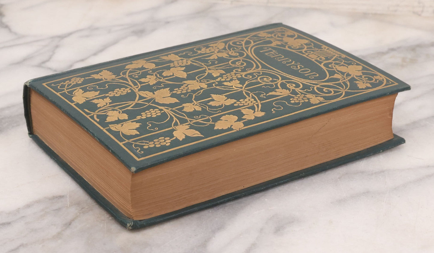 Lot 119 - "The Poetical Works Of Alfred Lord Tennyson" Antique Illustrated Poetry Book With Gold Embossed Designs And Lettering On Spine And Covers, Grape And Lute Motifs, Published By A.L. Burt, New York, Circa 1900