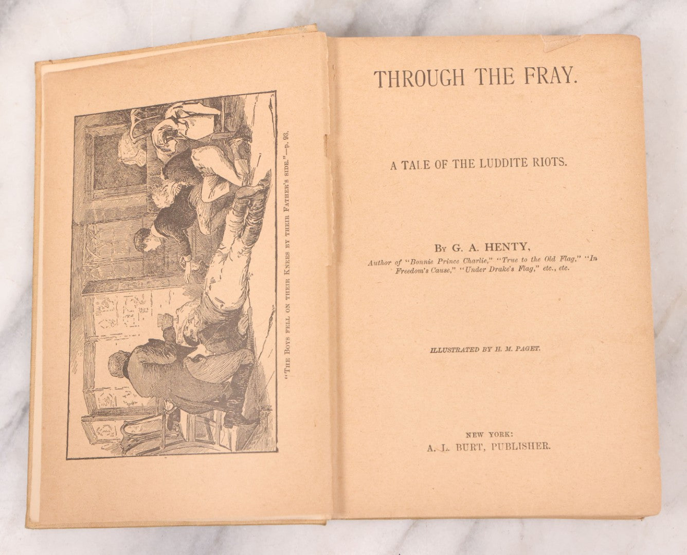 Lot 125 - "Through The Fray; A Tale Of The Luddite Riots" Antique Illustrated Novel By G.A. Henty, Cover And Spine Featuring Depictions Of Weapons And Battle Scenes, Published By A.L. Burt, New York, Circa 1900
