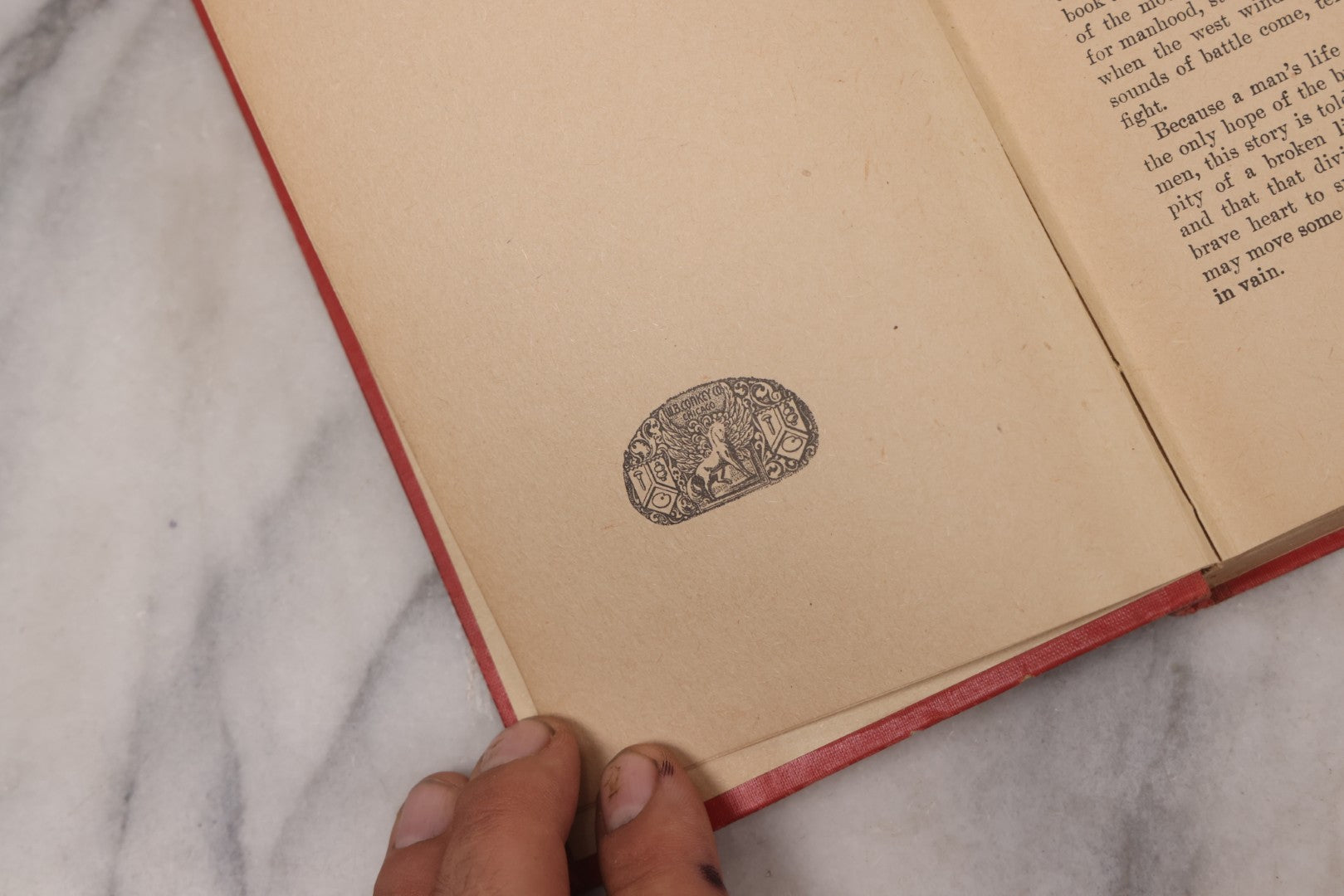 Lot 127 - "Black Rock; A Tale Of The Selkirks" Antique Novel By Ralph Connor, With Art Nouveau Design On Cover And Spine, Published By W.B. Conkey Company, Chicago, Circa 1900