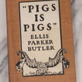 Lot 130 - "Pigs Is Pigs" Antique Illustrated Story Book With Odd Illustration On Cover Of Guinea Pigs Emptying Cornucopias Full Of Miniature Guinea Pigs, By Ellis Parker Butler, Published By McClure, Phillips And Co., 1906