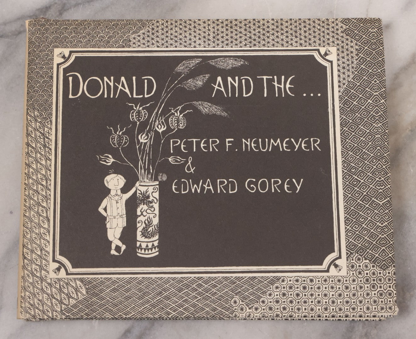 Lot 139 - Pair Of Modern Books Written And Illustrated By Edward Gorey, "Donald And The..." (2004 Reprint) Co-Authored By Peter F. Neumeyer And "The Epiplectic Bicycle" (1997 Reprint)