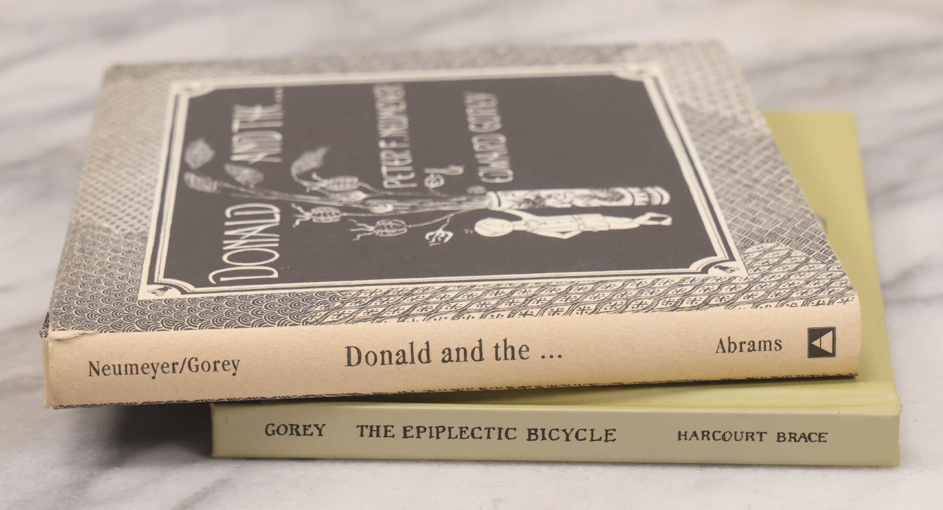 Lot 139 - Pair Of Modern Books Written And Illustrated By Edward Gorey, "Donald And The..." (2004 Reprint) Co-Authored By Peter F. Neumeyer And "The Epiplectic Bicycle" (1997 Reprint)
