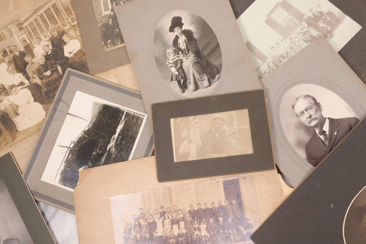 Lot 141 - Grouping Of Eleven Antique Boarded And Other Photographs Of Various Subjects Including School Classes, Man On Porch, Portraits, Bridge, And Others