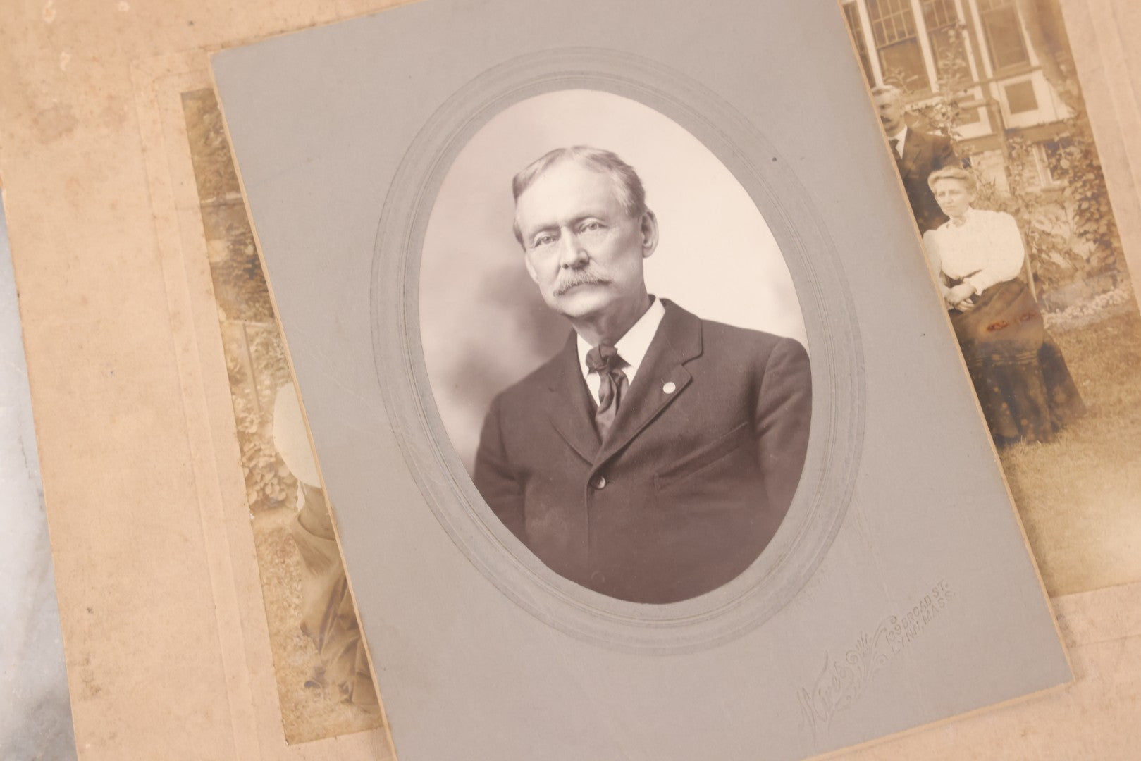 Lot 141 - Grouping Of Eleven Antique Boarded And Other Photographs Of Various Subjects Including School Classes, Man On Porch, Portraits, Bridge, And Others