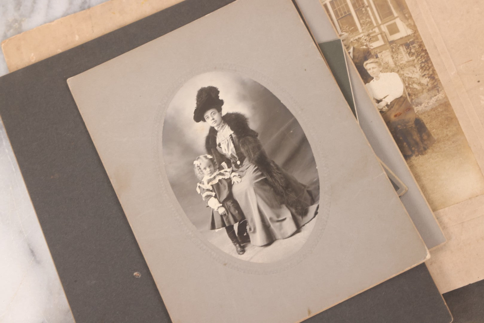 Lot 141 - Grouping Of Eleven Antique Boarded And Other Photographs Of Various Subjects Including School Classes, Man On Porch, Portraits, Bridge, And Others