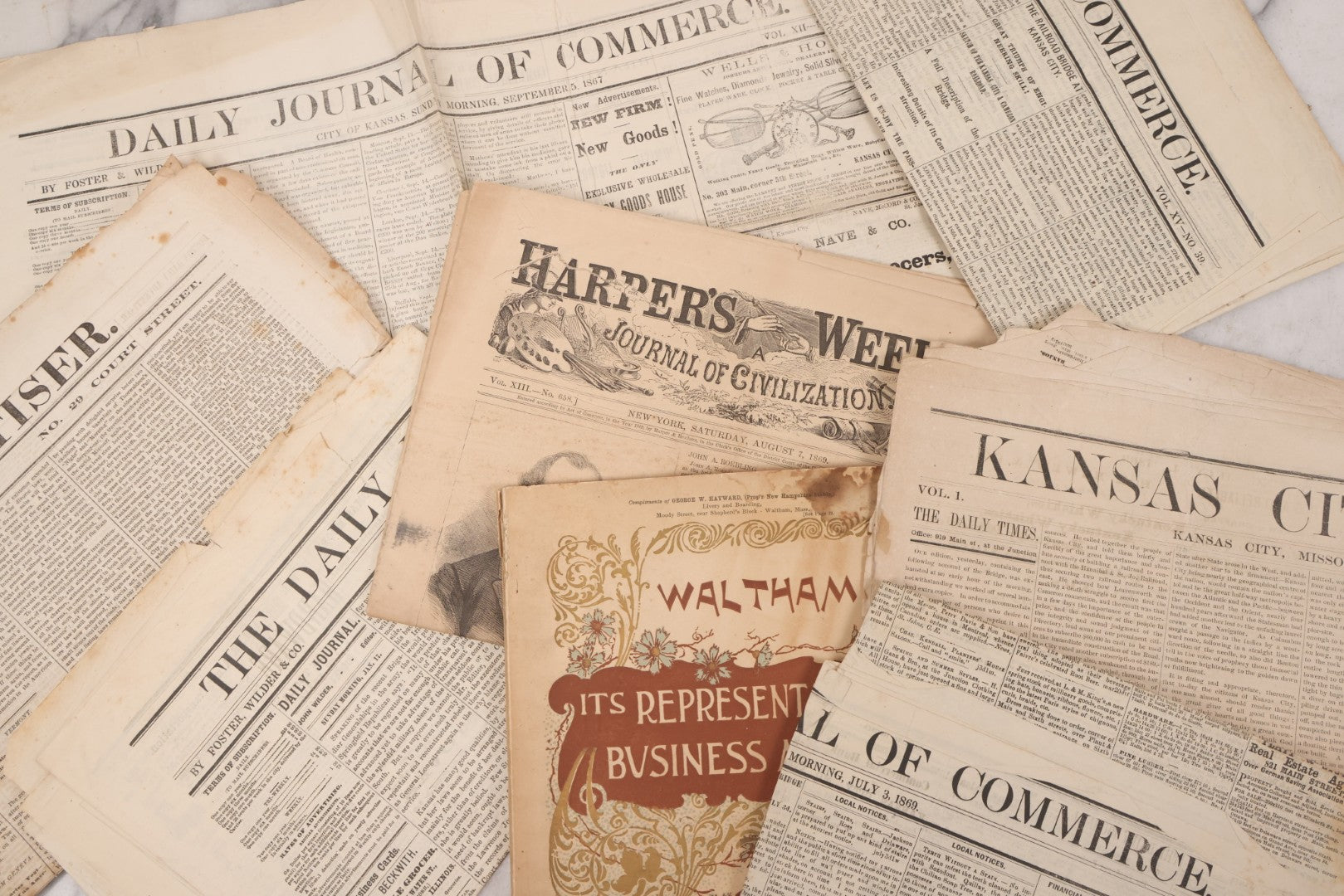 Lot 143 - Grouping Of Seven Antique Commerce Related Ephemera Pieces Including 1860s Era Journals Of Commerce, Kansas City, Waltham Massachusetts Businessmen Directory, And Other Items