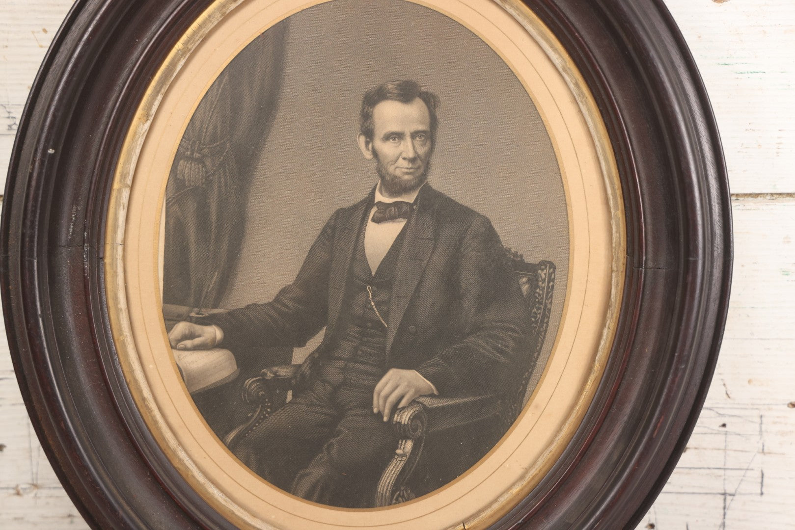 Lot 005 - Antique Engraving Print Of President Abraham Lincoln At Desk With Emancipation Proclamation, After George E. Perine, In Period Oval Frame With Original Glass And Wood Backing, Circa 1864, 14" x 16"