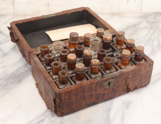 Lot 006 - Antique Traveling Apothecary Box Kit With Key, 24-Section Interior With 22 Bottles And 4 Smaller Bottles, Including Belladonna, Nux Vomica, Chamomilla, Arsenicum, And Tartarus Emeticus, Boericke & Tafel Homeopathic Pharmacy, New York & Chicago