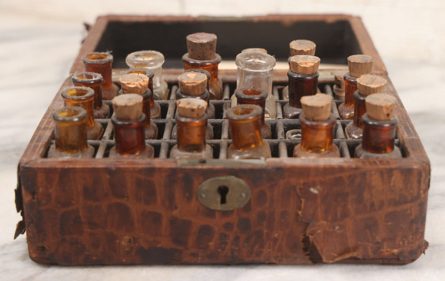 Lot 006 - Antique Traveling Apothecary Box Kit With Key, 24-Section Interior With 22 Bottles And 4 Smaller Bottles, Including Belladonna, Nux Vomica, Chamomilla, Arsenicum, And Tartarus Emeticus, Boericke & Tafel Homeopathic Pharmacy, New York & Chicago