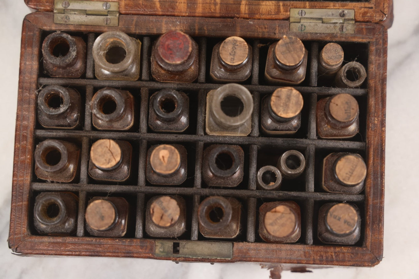 Lot 006 - Antique Traveling Apothecary Box Kit With Key, 24-Section Interior With 22 Bottles And 4 Smaller Bottles, Including Belladonna, Nux Vomica, Chamomilla, Arsenicum, And Tartarus Emeticus, Boericke & Tafel Homeopathic Pharmacy, New York & Chicago
