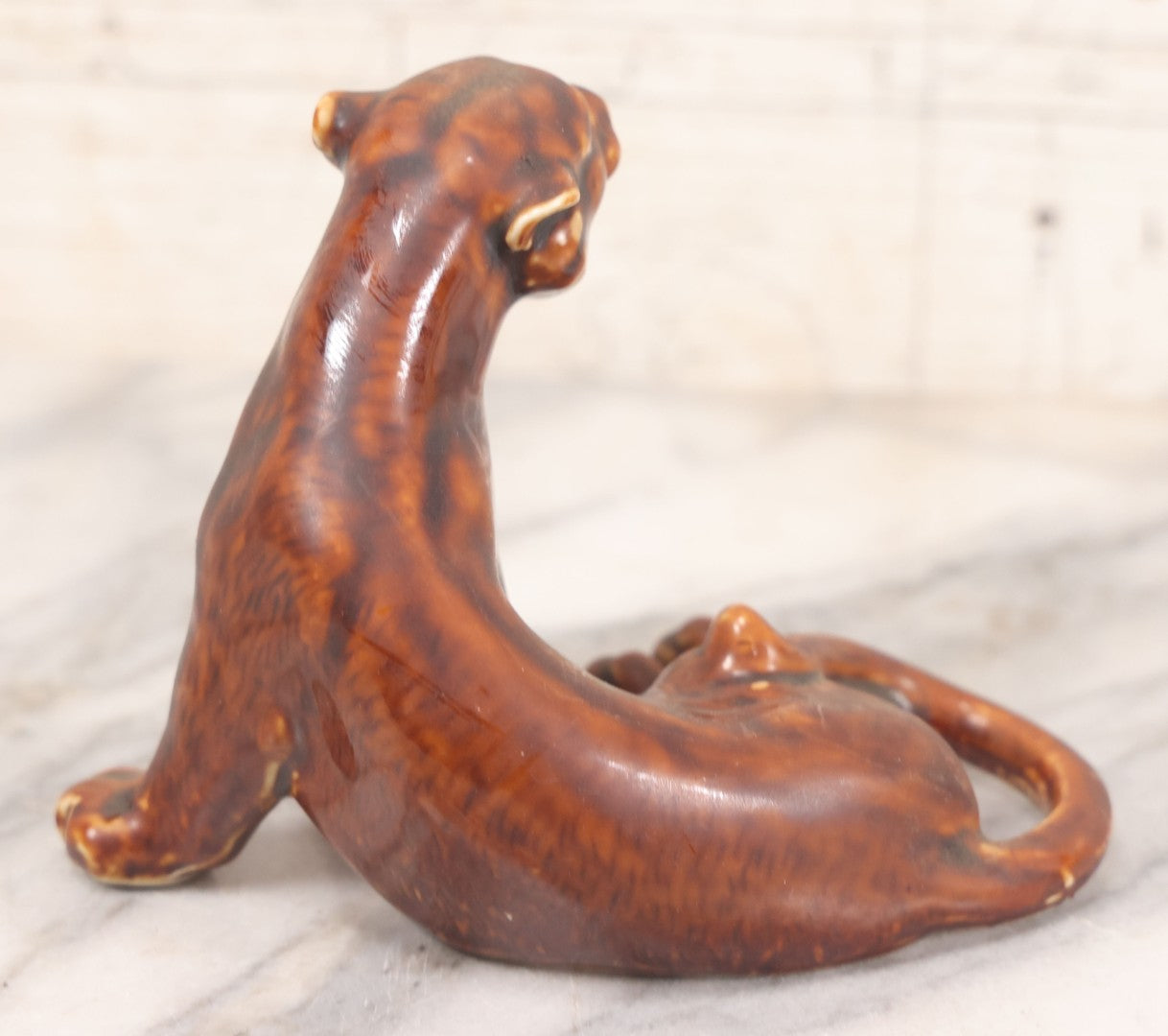 Lot 017 - Pair Of Vintage Ceramic Brown Painted Tigers In Reclined And Pacing Poses