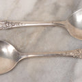 Lot 019 - Antique Pair Of Sterling Silver Curved Pointed Scooping Spoons, Decorative Handles With Rose Motif, Marked Westmoreland Sterling, Total Weight 1.9 Troy Ounces