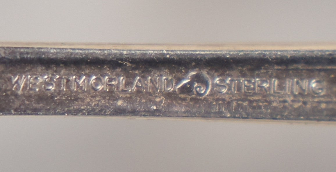 Lot 019 - Antique Pair Of Sterling Silver Curved Pointed Scooping Spoons, Decorative Handles With Rose Motif, Marked Westmoreland Sterling, Total Weight 1.9 Troy Ounces