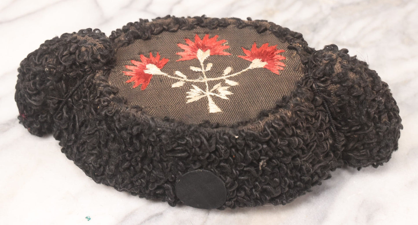 Lot 024 - Antique Matador Hat (Montera) With Black Looped Wool Exterior, Embroidered Floral Crown, And Pink Silk Lining