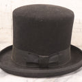 Lot 025 - Antique Black Wool Felt Top Hat With Grosgrain Ribbon Band And Bow, Early 20th Century