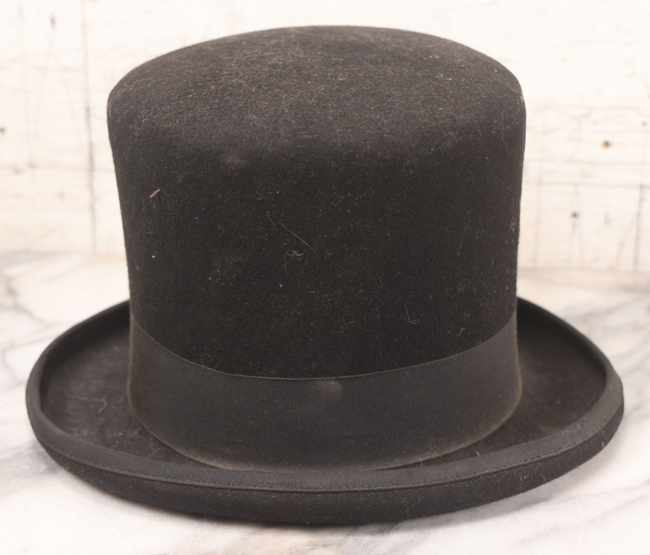 Lot 025 - Antique Black Wool Felt Top Hat With Grosgrain Ribbon Band And Bow, Early 20th Century