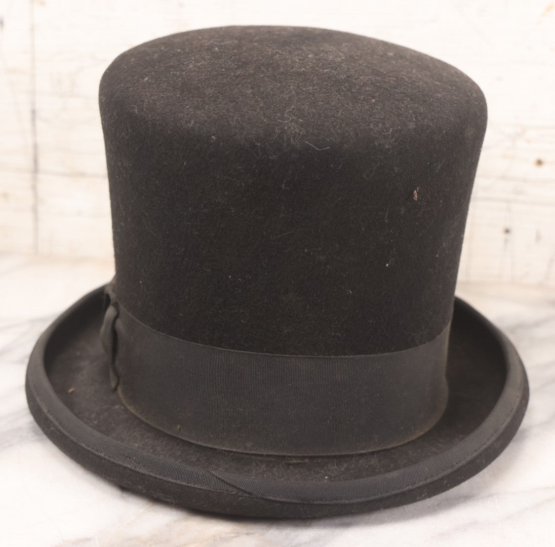 Lot 025 - Antique Black Wool Felt Top Hat With Grosgrain Ribbon Band And Bow, Early 20th Century