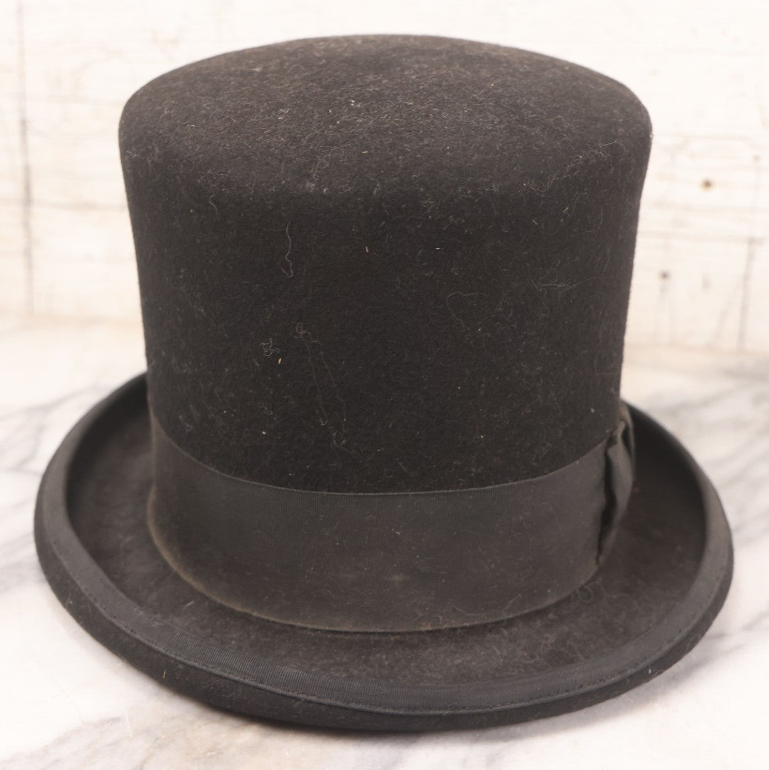 Lot 025 - Antique Black Wool Felt Top Hat With Grosgrain Ribbon Band And Bow, Early 20th Century