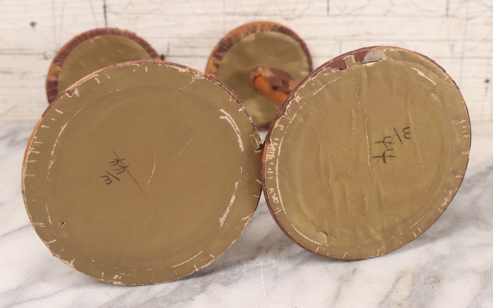 Lot 029 - Trio Of Vintage Hat Stands Including Two With Partial Fabric Coverings And Greenish-Yellow Ribbons, And One Blue Wire Stand With Felt Pillow