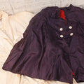 Lot 030 - Vintage Nurse's Outfit Including White Dress With Tag “A Romance Import, Sanforized, Washable, Made In Japan, Size 10” And Synthetic Cape With Purple Exterior And Red Lining