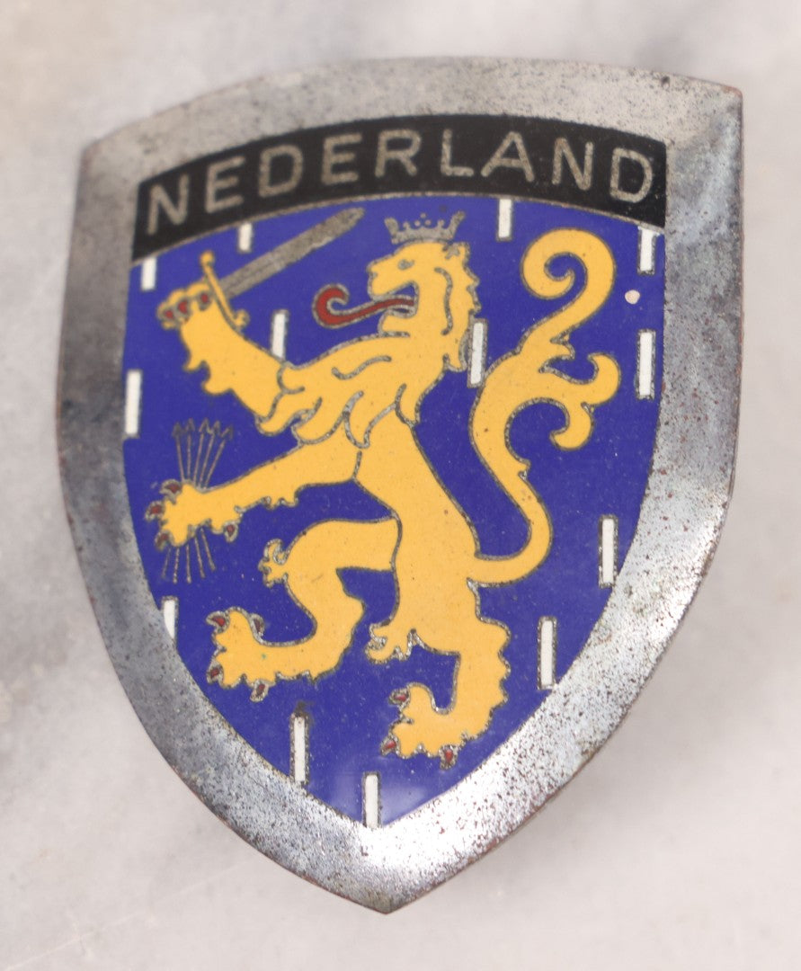 Lot 034 - Grouping Of Three Vintage Automobile Badges Including Nederland Lion Crest, Triumph Sports Owners Association, And M.A.S.C.D.C.S. Car Club