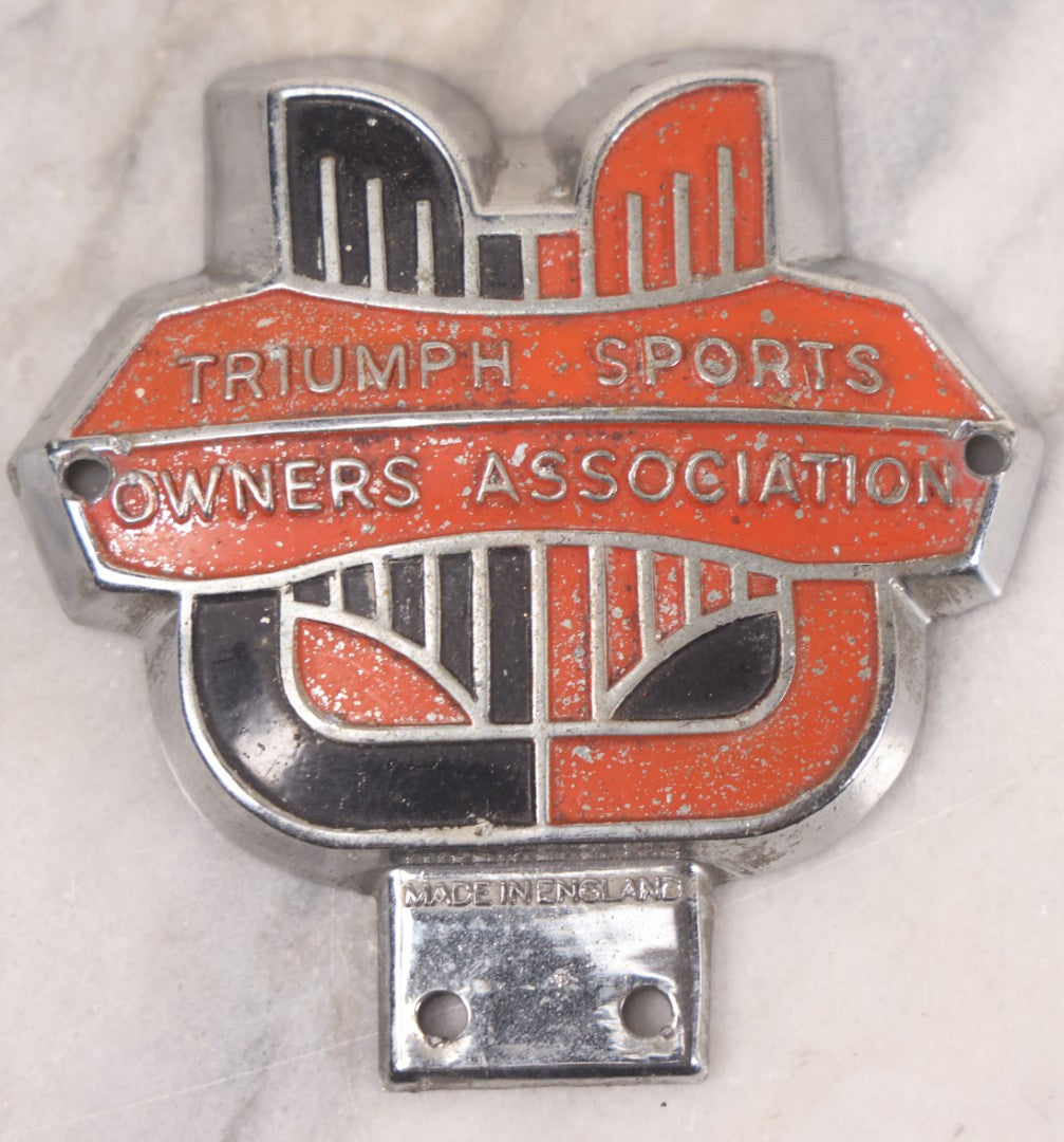 Lot 034 - Grouping Of Three Vintage Automobile Badges Including Nederland Lion Crest, Triumph Sports Owners Association, And M.A.S.C.D.C.S. Car Club