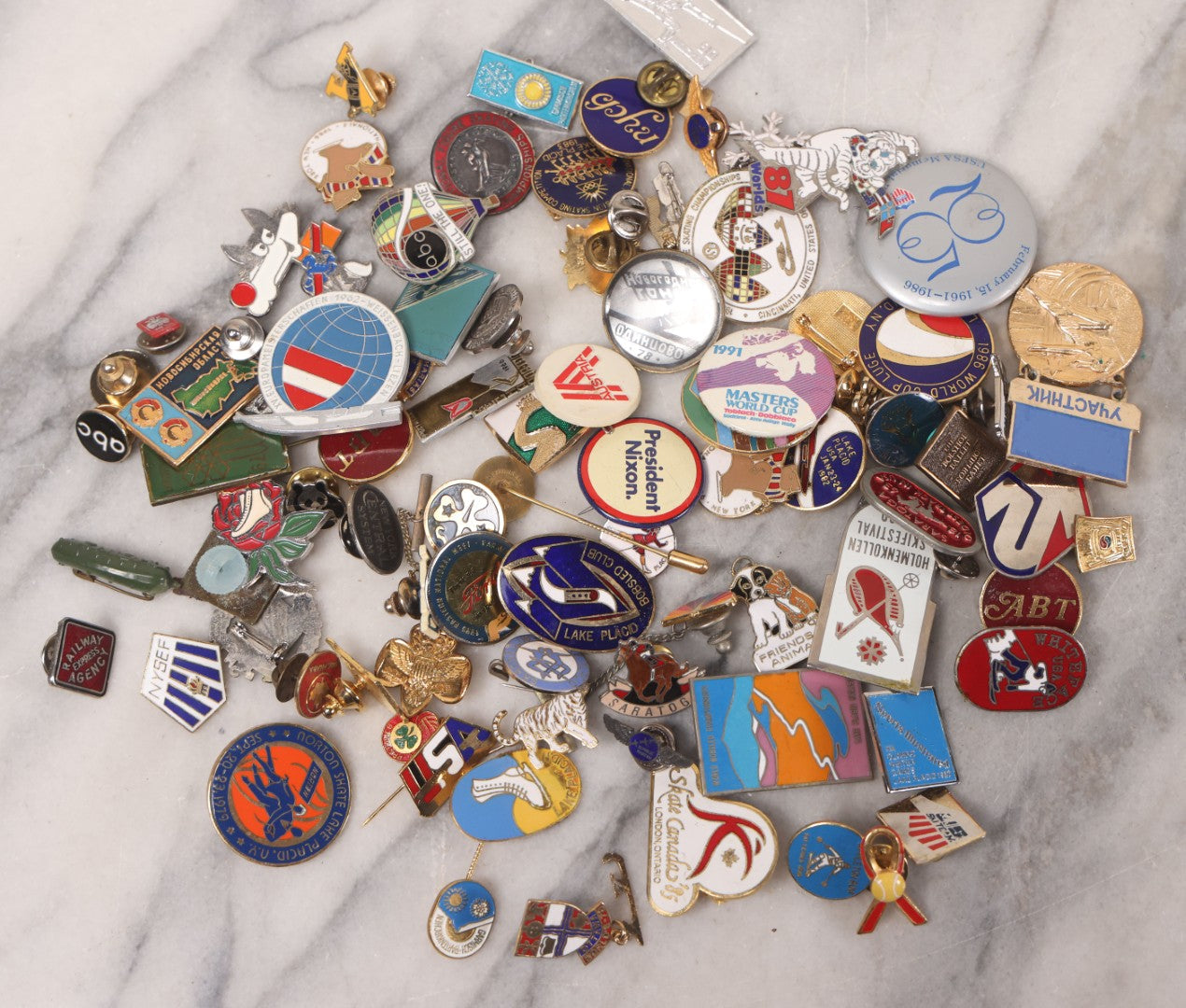 Lot 037 - Grouping Of 85+ Vintage And Modern Pins Including Winter Sports, Skiing, Figure Skating, Racing, Golf, Aviation, And Broadcasting, With Examples From A.B.C., N.B.C., And Several In Sterling Silver