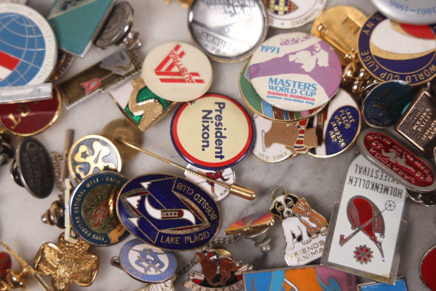 Lot 037 - Grouping Of 85+ Vintage And Modern Pins Including Winter Sports, Skiing, Figure Skating, Racing, Golf, Aviation, And Broadcasting, With Examples From A.B.C., N.B.C., And Several In Sterling Silver