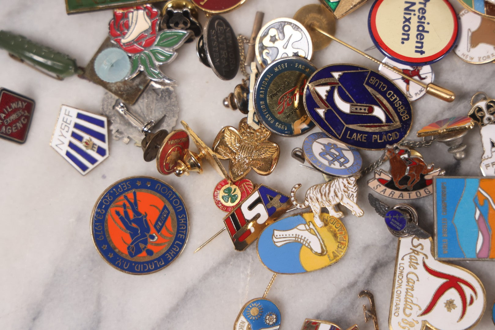 Lot 037 - Grouping Of 85+ Vintage And Modern Pins Including Winter Sports, Skiing, Figure Skating, Racing, Golf, Aviation, And Broadcasting, With Examples From A.B.C., N.B.C., And Several In Sterling Silver
