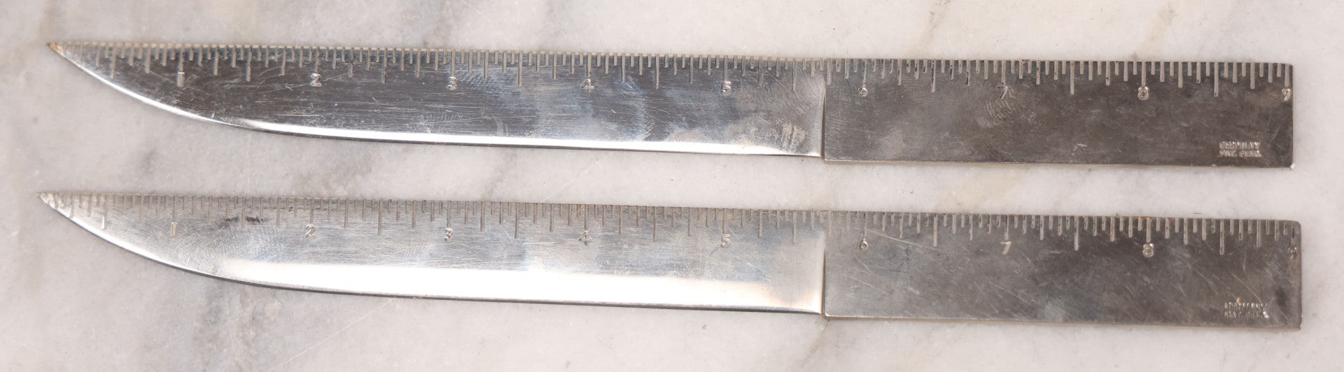 Lot 039 - Pair Of Vintage German Stainless Steel Letter Openers With Eastern-Influenced Enameled Geometric Design In Monogrammed Leather Sheath