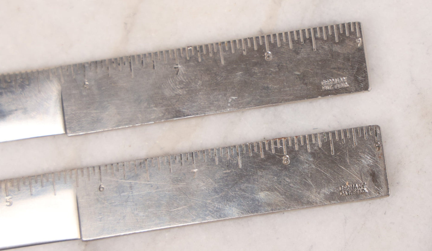 Lot 039 - Pair Of Vintage German Stainless Steel Letter Openers With Eastern-Influenced Enameled Geometric Design In Monogrammed Leather Sheath