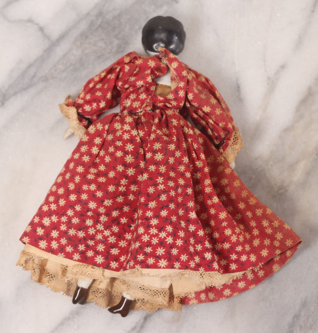 Lot 041 - Pair Of Antique Miniature Dolls Including China Head Doll With Floral Red Dress, Bisque Hands And Feet, And Papier Mache Head Doll With Cloth Body, 4-1/4" H And 7" H