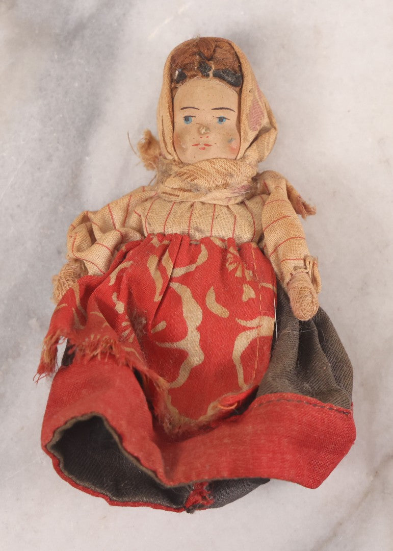 Lot 041 - Pair Of Antique Miniature Dolls Including China Head Doll With Floral Red Dress, Bisque Hands And Feet, And Papier Mache Head Doll With Cloth Body, 4-1/4" H And 7" H