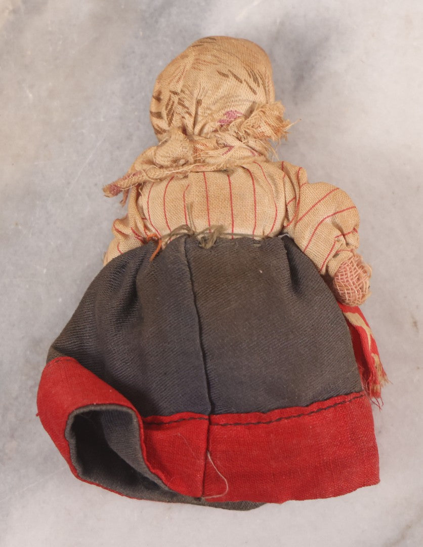 Lot 041 - Pair Of Antique Miniature Dolls Including China Head Doll With Floral Red Dress, Bisque Hands And Feet, And Papier Mache Head Doll With Cloth Body, 4-1/4" H And 7" H