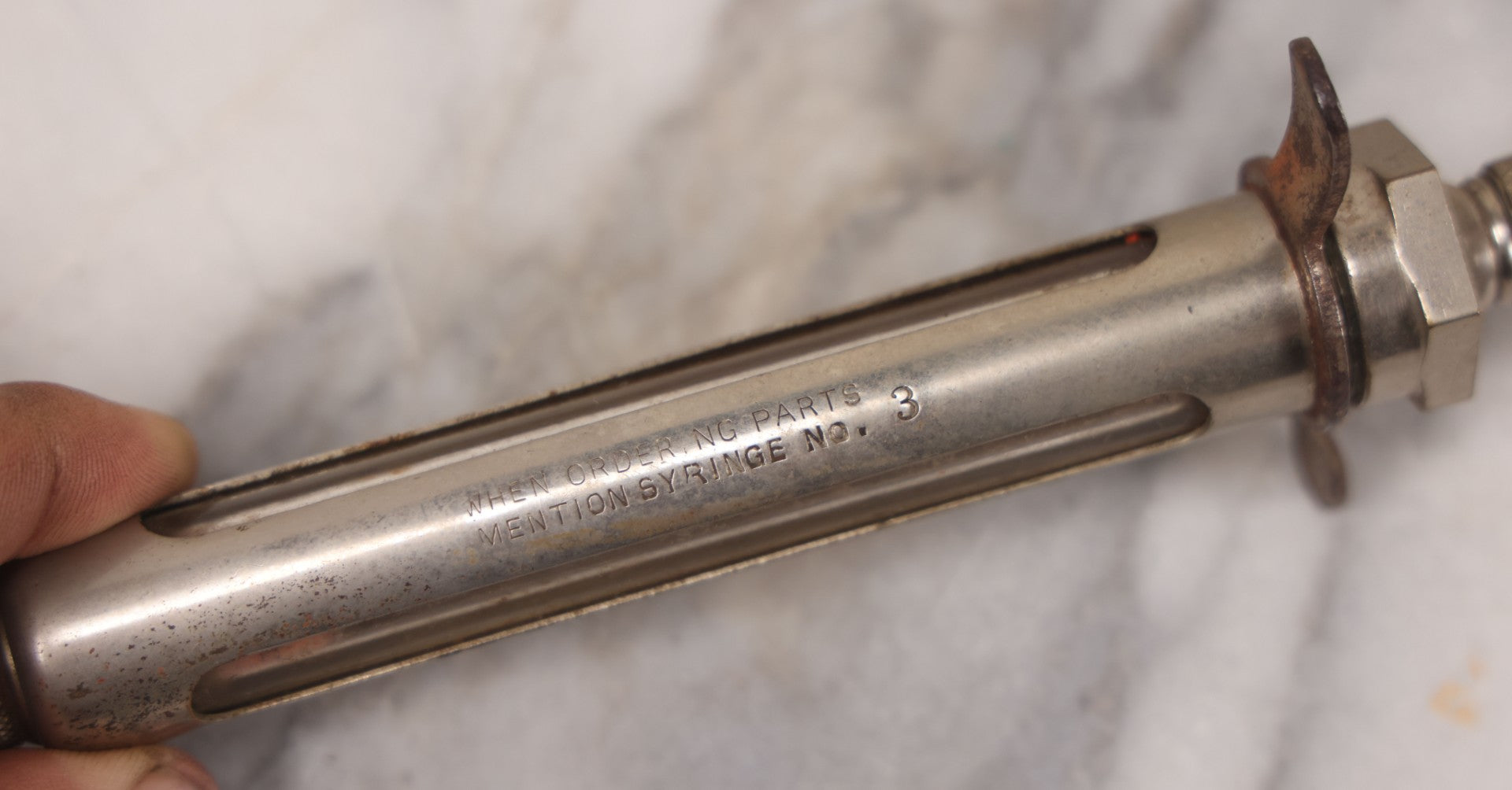 Lot 045 - Antique “Reliable” Brand Syringe No. 3 With Metal Body And Glass Center Tube, With Box Of Vintage B.D. Needles