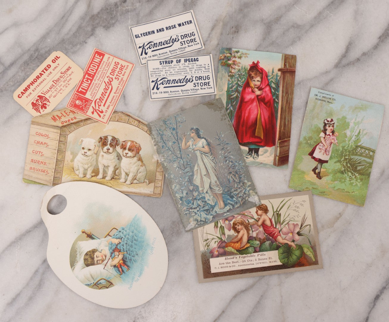 Lot 049 - Grouping Of Ten Antique Apothecary And Pharmacy Ephemera Items Including Carter's Iron Pills, Hood's Vegetable Pills, And Melvin's Cough Syrup And Other Trade Cards, With Four Unused Paper Labels