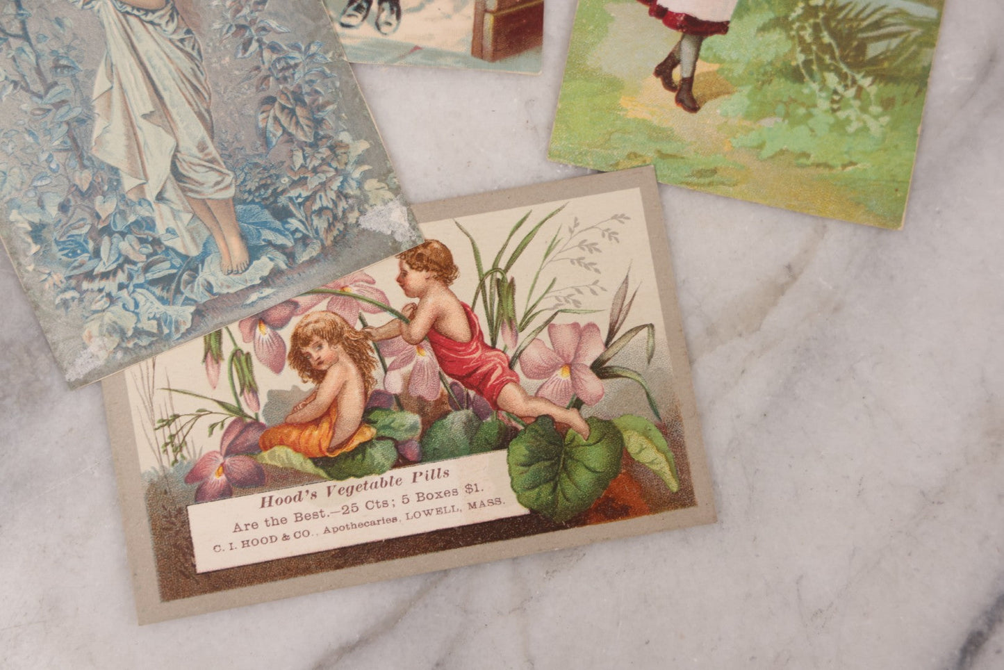 Lot 049 - Grouping Of Ten Antique Apothecary And Pharmacy Ephemera Items Including Carter's Iron Pills, Hood's Vegetable Pills, And Melvin's Cough Syrup And Other Trade Cards, With Four Unused Paper Labels